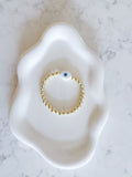 White Ceramic Evil Eye Bracelet with 6mm 14kt Gold Plated Beads